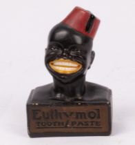 A Euthymol toothpaste advertising bust wearing a Fez, circa 1930,