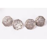 A pair of silver cufflinks, adapted from buttons, each octagonal link engraved a horseman,