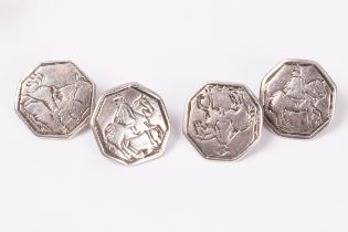 A pair of silver cufflinks, adapted from buttons, each octagonal link engraved a horseman,