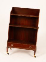 A Regency mahogany waterfall front open bookcase, boxwood strung and fitted a drawer to the base,