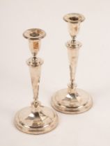 A pair of Adam style silver candlesticks, Sheffield 1911,