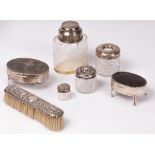 A quantity of silver mounted dressing table items including clothes brush,