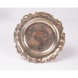 A Victorian silver dish, John Samuel Hunt, London 1844, with shell and scroll border,