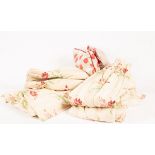 Two pairs of lined floral curtains,