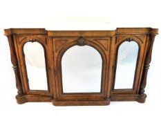 A 19thC. walnut sideboard with marble top & mirror