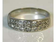 A white metal ring set with approx. 0.54ct diamond, tests electronically as 18ct gold, 3.6g, size Q