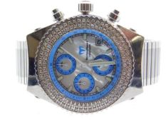 A ladies Technomarine Chronograph with approx. 1ct diamond bezel, boxed with two sports straps