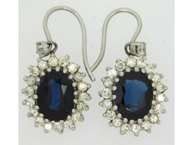 A pair of 18ct white gold diamond & sapphire earri