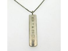 A 2001 Tiffany & Co. silver necklace & pendant wit