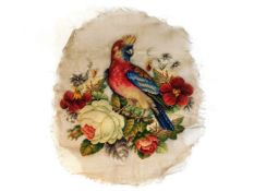 A 19thC. Berlin raised wool work of bird & flowers