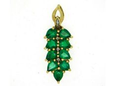 A 9ct gold pendant set with diamond & emeralds, 38mm drop, 2.5g