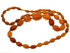 A Victorian amber necklace, 25in long, 30.1g, larg