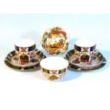 Two Royal Crown Derby imari trios with a matching