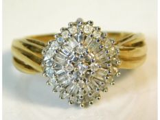 A 9ct gold cluster ring set with 0.33ct of diamond