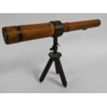 A Davidson's leather bound brass telescope, once t