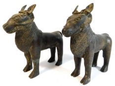 A pair of early 20thC. tribal art Benin bronze goa