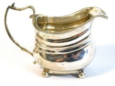 A George III 1817 London sliver cream jug, maker m