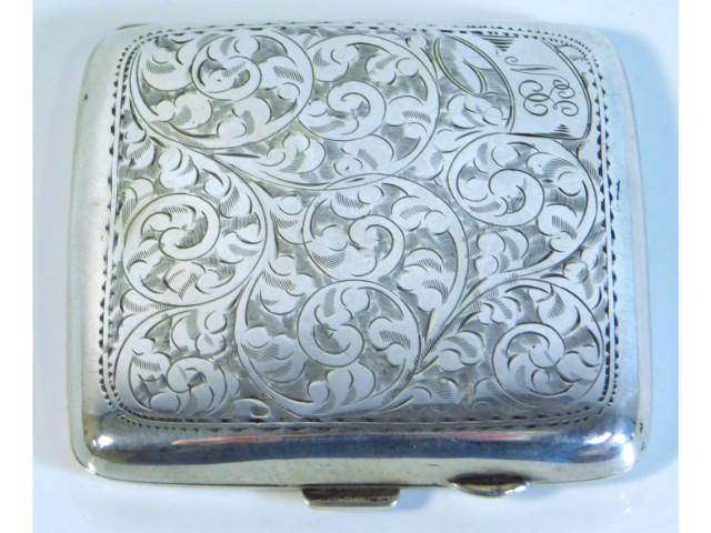 A 1925 Birmingham silver cigarette case with chase