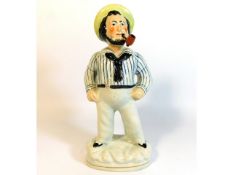 A 19thC. Staffordshire figure of Jack Tar, 11.5in
