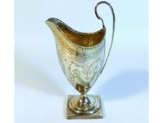 A George III London 1793 silver cream jug by Solom