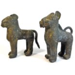 A pair of naïve 19thC. tribal art Benin bronze leo