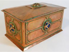 An arts & crafts copper box set with encased Ruski