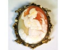 A large yellow metal cameo brooch, electronically tests as 9ct gold, 63mm high, 21g