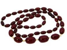 A cherry amber style necklace, 30in long, 45.4g, l