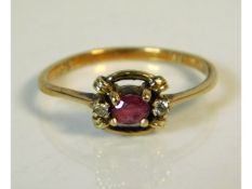 A 9ct gold ring set with ruby & diamond, 1g, size