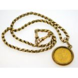 A 9ct gold 18in long Albert chain, mounted with a 1795 George III guinea, 28.6g