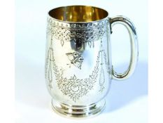 An 1877 London silver christening cup with gilding