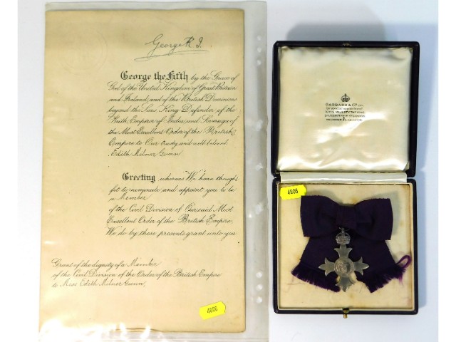 A George V MBE medal awarded to Miss. Edith Milner