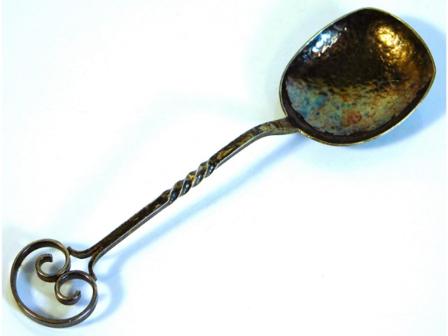 An Australian 1920's arts & crafts style Hobart silver spoon, 18.5g, marked D.B - possibly Sargison
