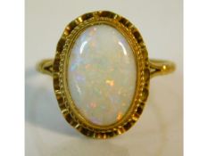 A 9ct gold ring set with opal, 2.8g, stone size 14.5mm x 10.5mm, size R/S