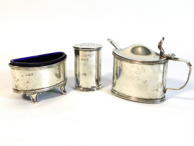A 1934 Chester silver Stokes & Ireland mustard twinned with other silver pepper pot & salt, total si