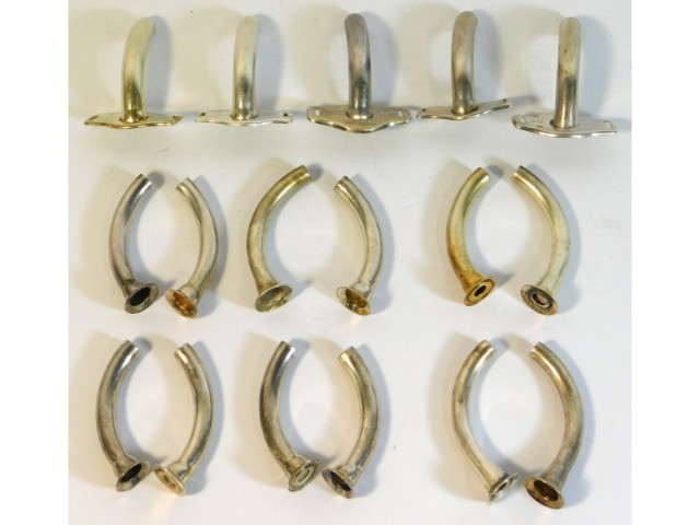 Seventeen Downs silver surgical tracheotomy tubes,