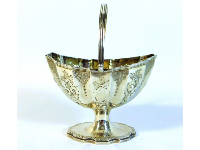 A George III 1791 London silver sugar basket by Wi