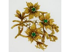 An 18ct brooch of organic design set with approx.