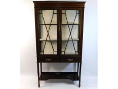 An Edwardian glazed mahogany display cabinet, 65.7