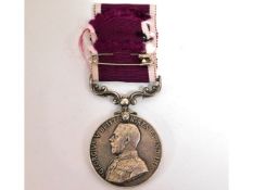 A George V medal awarded for Long Service & Good C