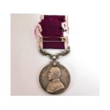 A George V medal awarded for Long Service & Good C