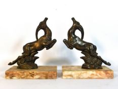 A pair of art deco period spelter antelope garnitu