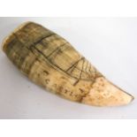 A 19thC. worked small sperm whale tooth scrimshaw,