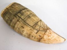 A 19thC. worked small sperm whale tooth scrimshaw,