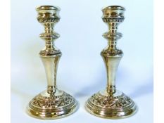 A pair of 1974 Birmingham silver W. I. Broadway candle holders, 7.5in tall, 850g inc.