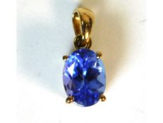 A 9ct gold pedant set with tanzanite, 13mm high, 0