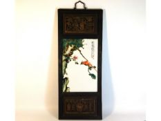 A c.1900 Chinese hand painted & enamelled porcelain plaque set within carved hardwood mount, 29.875i