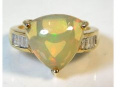 A 9ct gold ring set with Ethiopian opal & diamond,