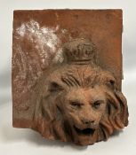 A 19thC. terracotta lion head, part of possibly a