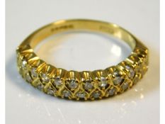 An 18ct gold ring set with approx. 0.5ct diamonds